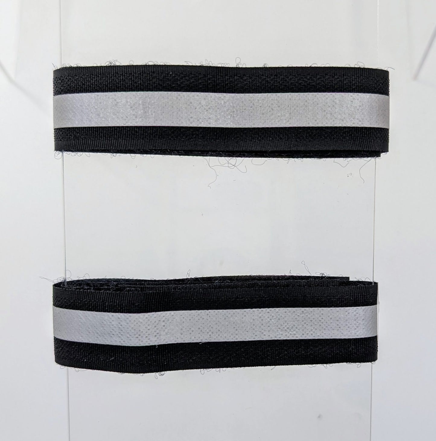 Ebon Accessories Ebon Pant-Tie safety item with adjustable strap and durable fabric for secure waist wear.