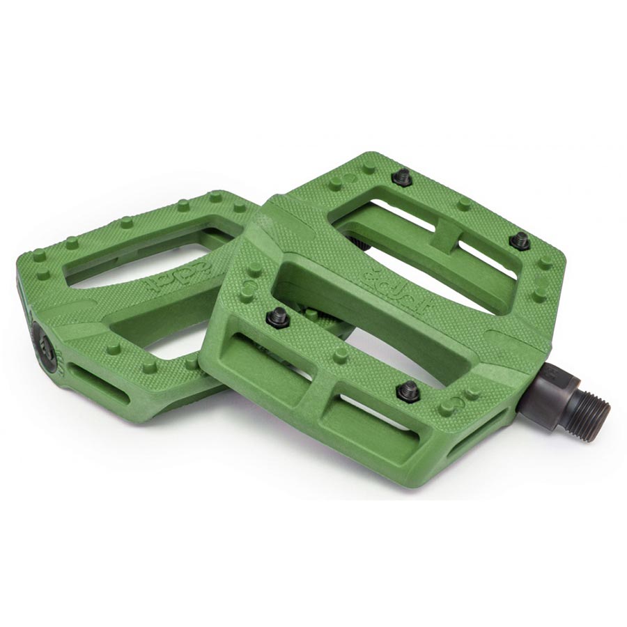 Pair of black Eclat Contra platform pedals with metal pins, designed for BMX bikes, shown from a side angle.