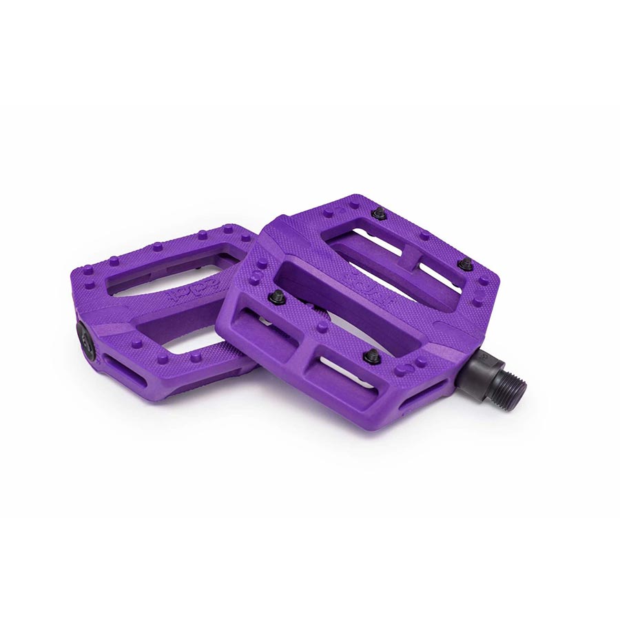 Pair of black Eclat Contra platform pedals with metal pins for BMX bikes, featuring a durable aluminum body and wide grip surface.