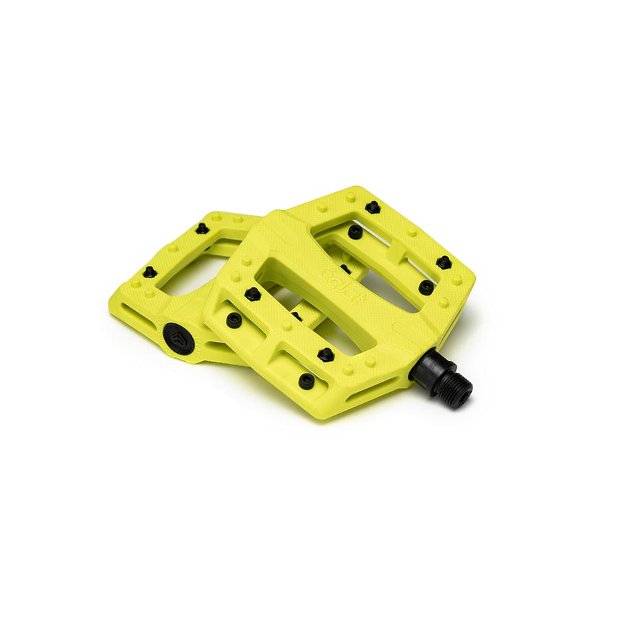 Pair of black Eclat Contra platform pedals with metal pins for BMX bikes, showing the textured pedal surface and brand logo.
