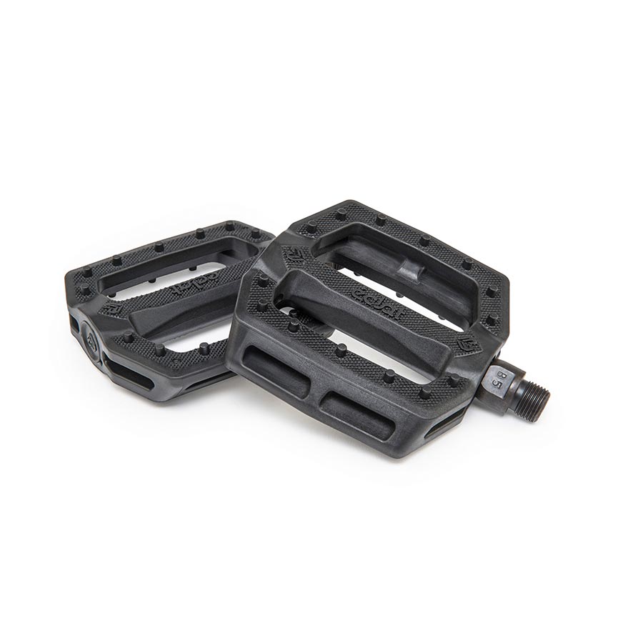 Black Eclat Slash platform pedals shown in a pair, featuring durable design and wide surface for BMX or mountain biking.