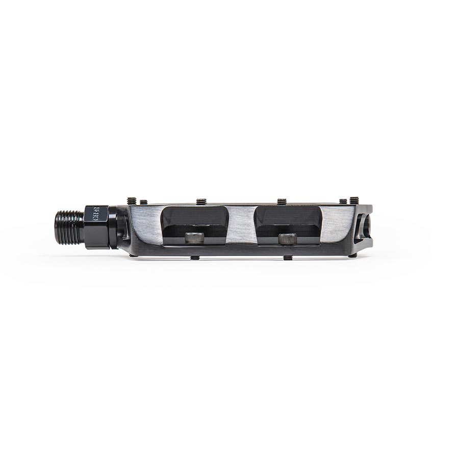 Pair of black Eclat Surge CNC platform pedals for BMX bikes, featuring durable metal construction and textured grip surfaces.