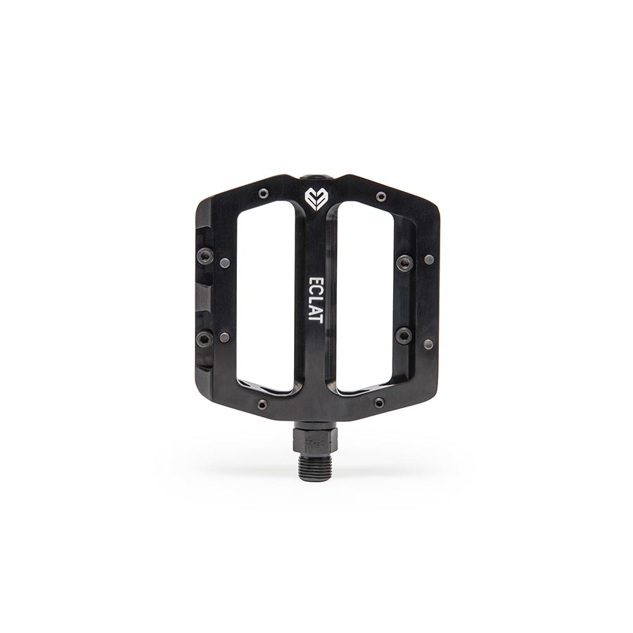 Pair of black Eclat Surge CNC platform pedals for BMX bikes, featuring durable metal construction and textured pedal surfaces.