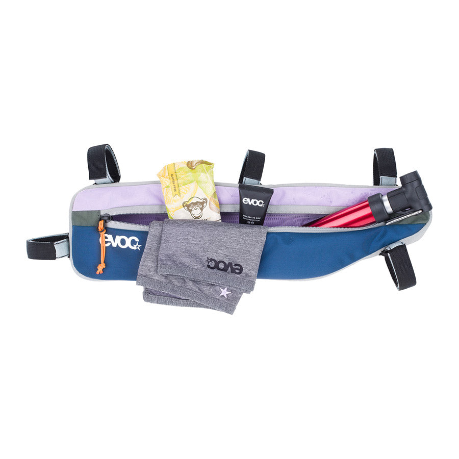 EVOC Frame Pack frame bag attached to a bicycle frame for carrying essentials during rides.