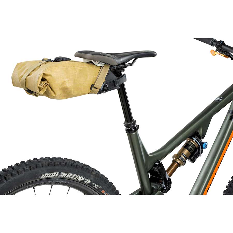 Grey EVOC Seat Pack Boa L seat bag with adjustable straps and compact storage for bike essentials.