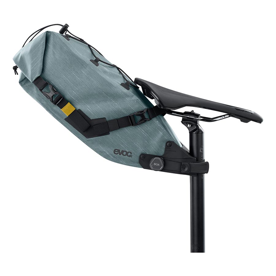 EVOC Seat Pack Boa WP seat bag in carbon grey, 12L capacity, designed for bike storage with secure fastening and weather-resistant features.