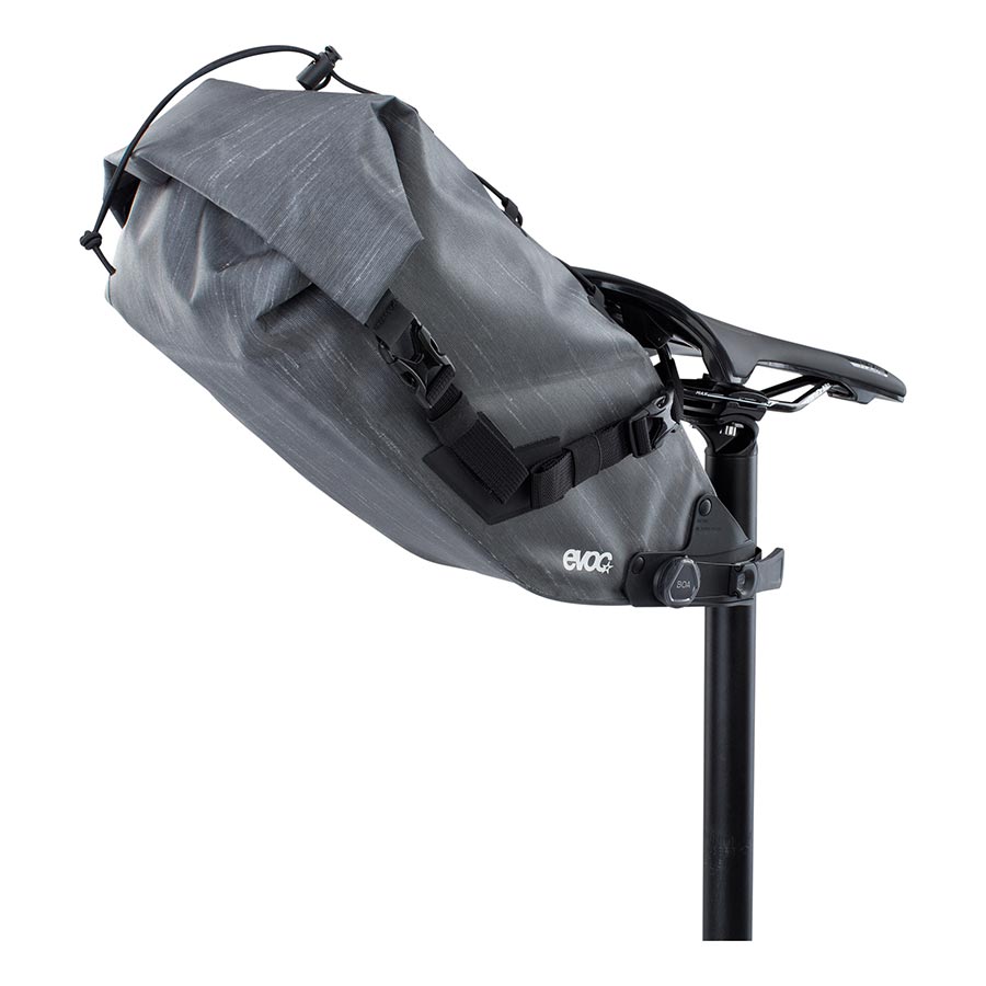 EVOC Seat Pack Boa WP seat bag in 12L, carbon grey, made for bike saddle with waterproof design and quick-closure system.