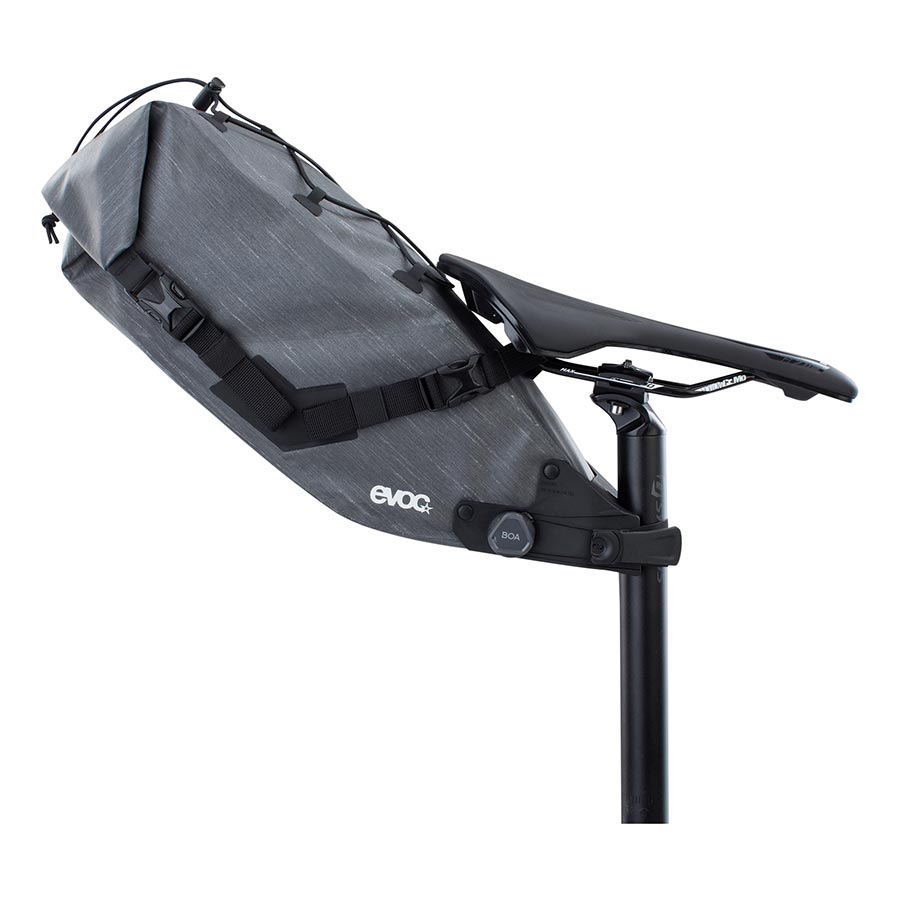 EVOC Seat Pack Boa WP seat bag in carbon grey with 12L capacity, designed for bike saddle storage and water resistance.