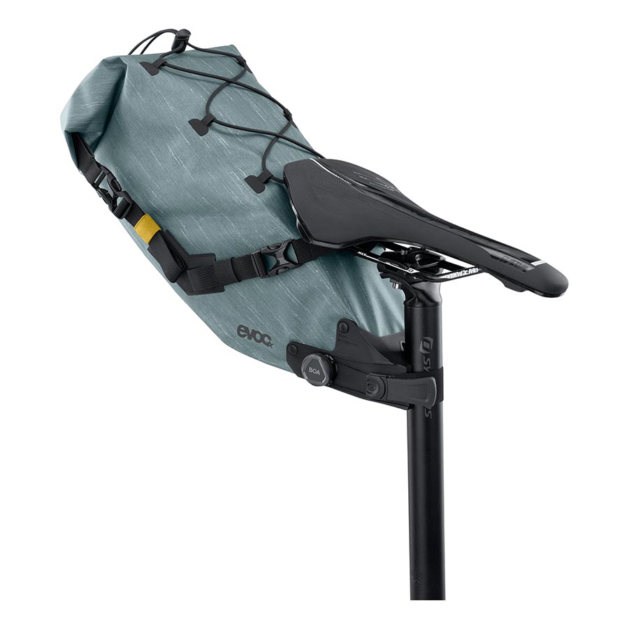 EVOC Seat Pack Boa WP mountain bike seat bag in carbon grey, 12L waterproof storage with secure strap system.