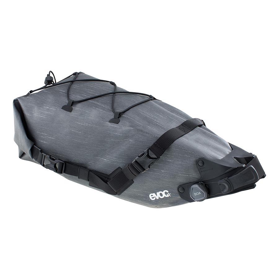 EVOC Seat Pack Boa WP seat bag in 12L carbon grey with secure straps and waterproof design for bike storage.