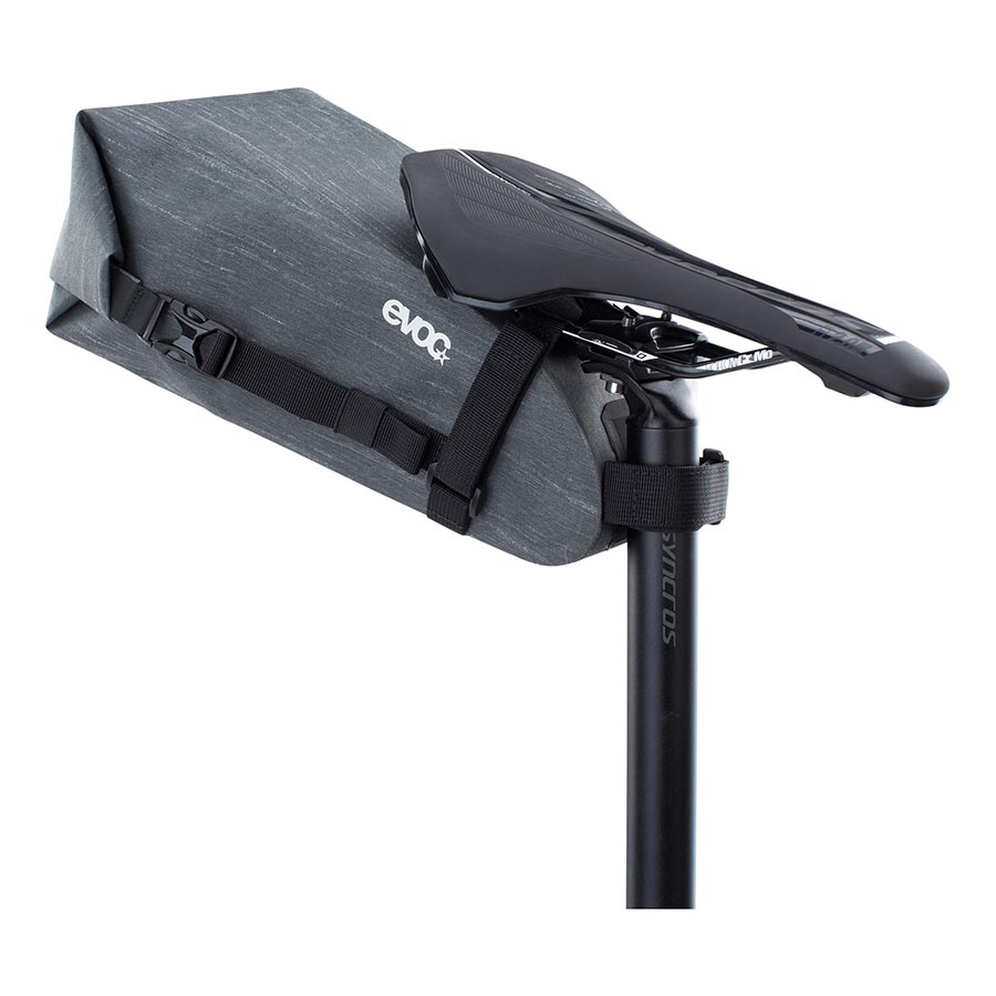 EVOC Seat Pack WP seat bag in carbon grey with 2L capacity, designed for bike saddle storage and hydration essentials.