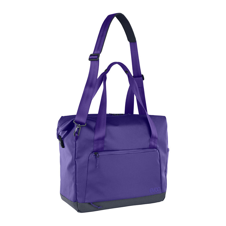 Violet EVOC Tote Travel 30 luggage duffle bag with sturdy handles and spacious main compartment for travel and storage.