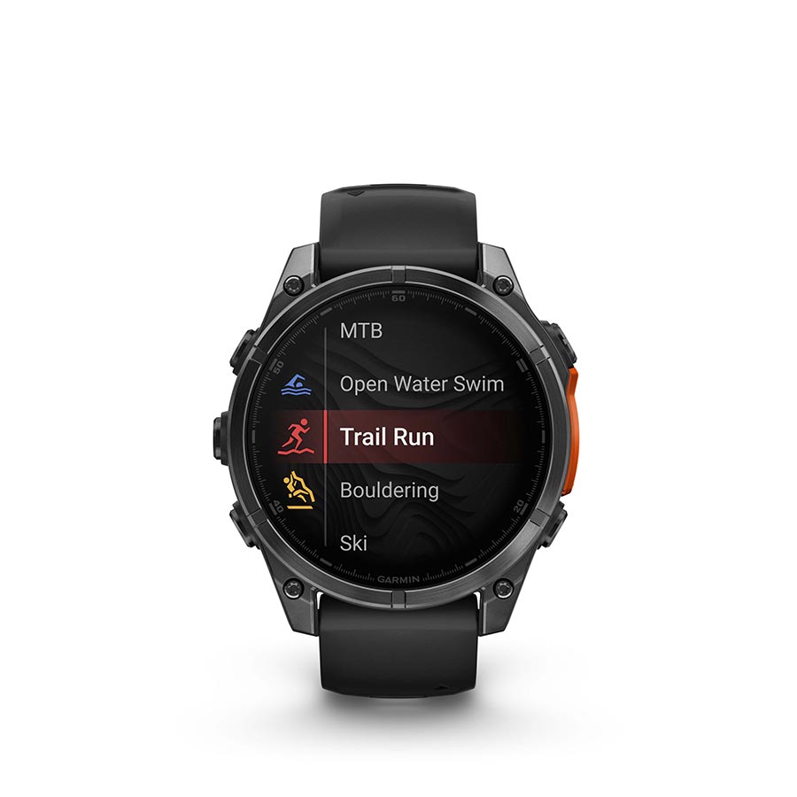 Garmin Fenix 8 AMOLED 47mm watch with slate grey case and black silicone wristband, displaying a digital watch face.