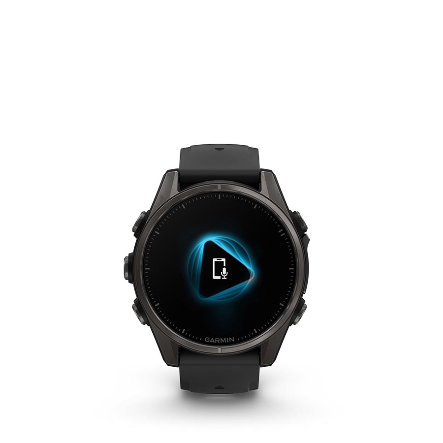 Garmin Fenix 8 AMOLED Sapphire 43mm smartwatch with grey silicone band and black pebble gray bezel on a wrist.