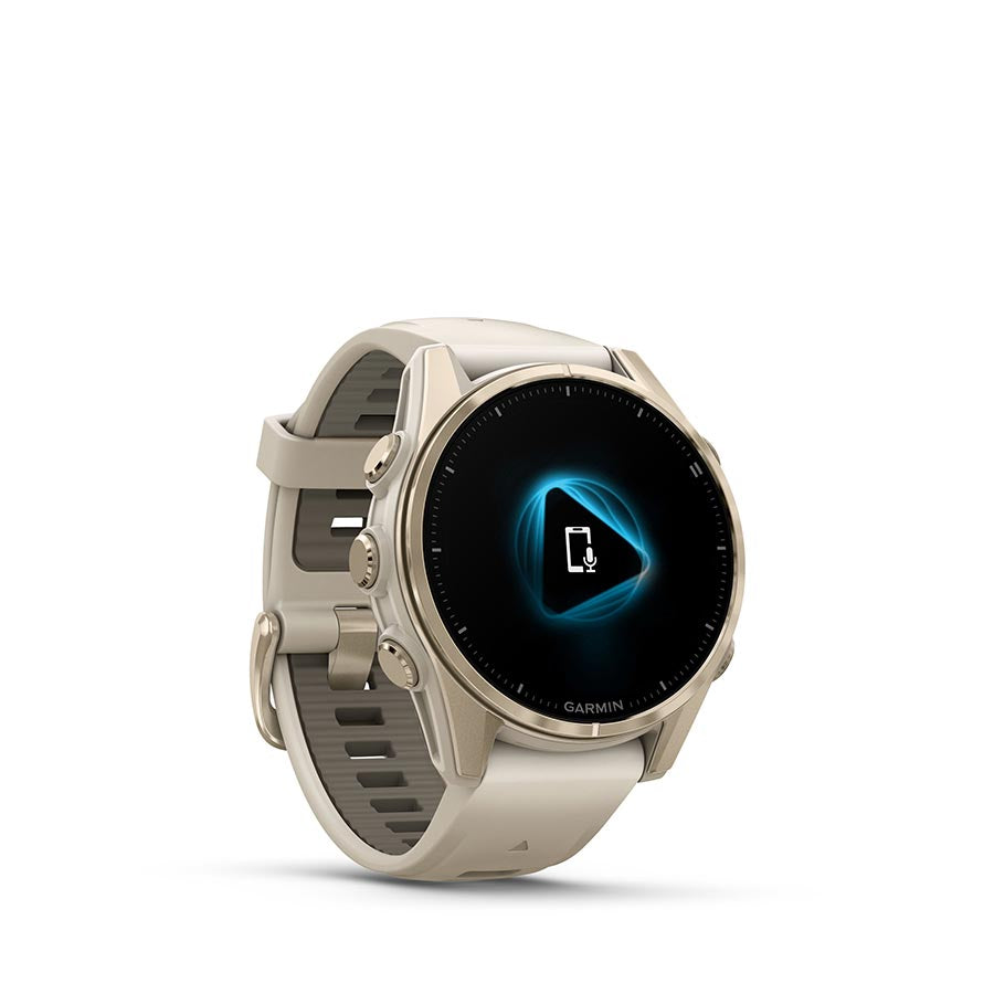 Garmin Fenix 8 AMOLED Sapphire 43mm watch with grey silicone wristband on a person's wrist, featuring a black pebble gray watch face.