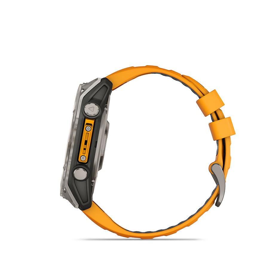 Garmin Fenix 8 AMOLED Sapphire 51mm watch with grey silicone wristband and black pebble bezel on a wrist.