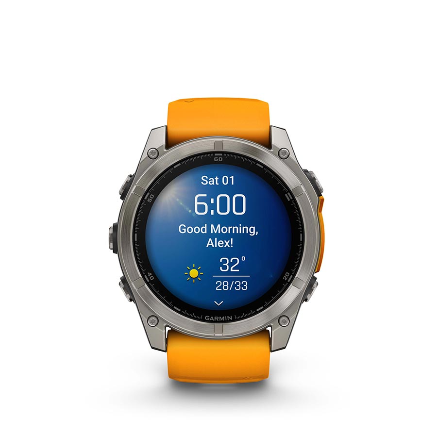 Garmin Fenix 8 AMOLED Sapphire 51mm watch with grey silicone wristband on a person's wrist, black bezel, pebble gray face.