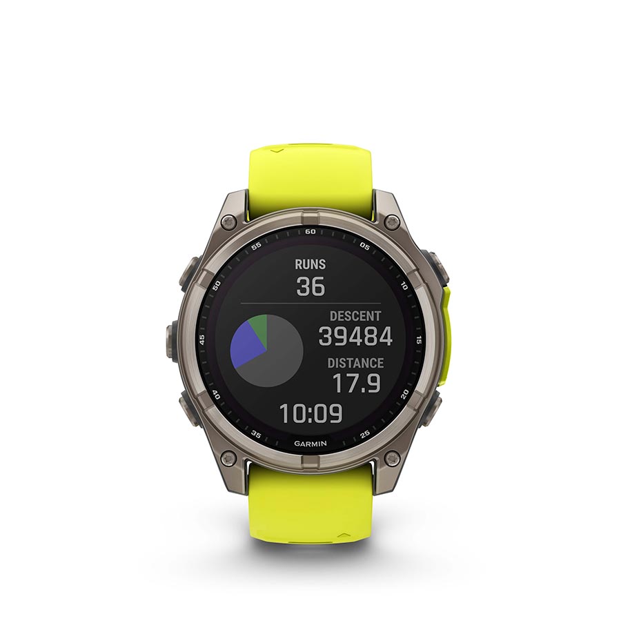 Garmin Fenix 8 Solar Sapphire 47mm watch with titanium wristband and yellow silicone accents, displayed on a wrist.