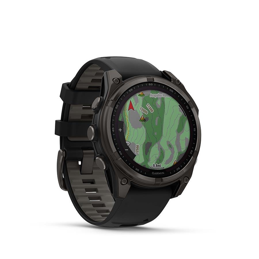 Garmin Fenix 8 Solar Sapphire 47mm smartwatch with titanium wristband and yellow silicone strap on a graphite background.