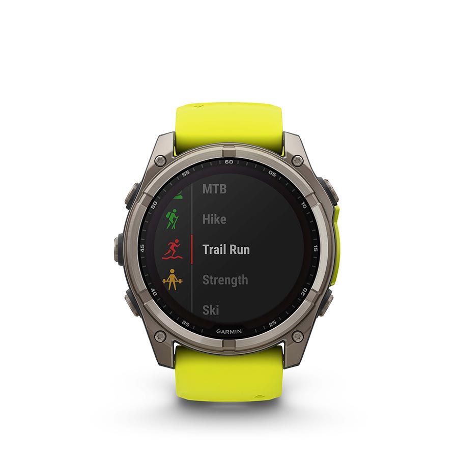Garmin Fenix 8 Solar Sapphire 51mm watch with titanium wristband and yellow silicone strap, showing a rugged outdoor design