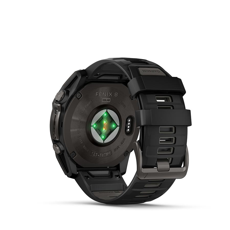 Garmin Fenix 8 Solar Sapphire 51mm watch with titanium wristband and yellow silicone strap, displayed on a wrist.