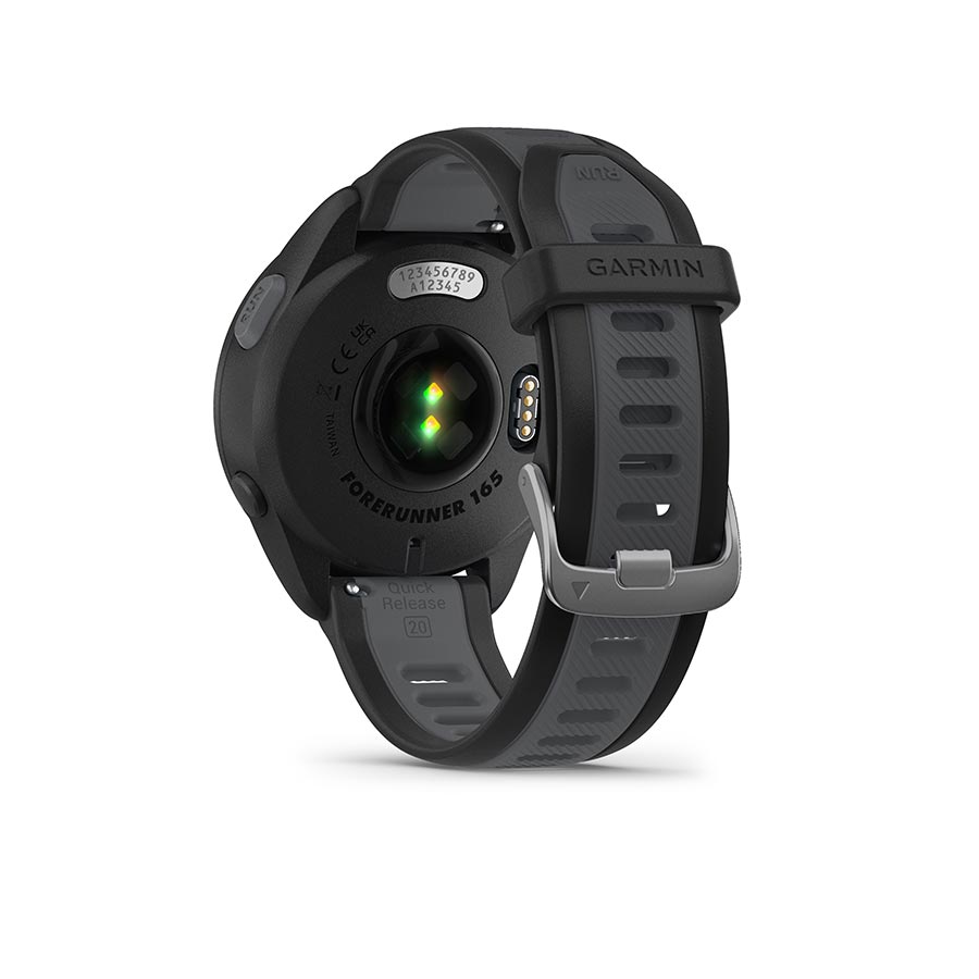 Garmin Forerunner 165 Music smartwatch with a berry wristband and lilac silicone strap, showing digital display on the watch face.
