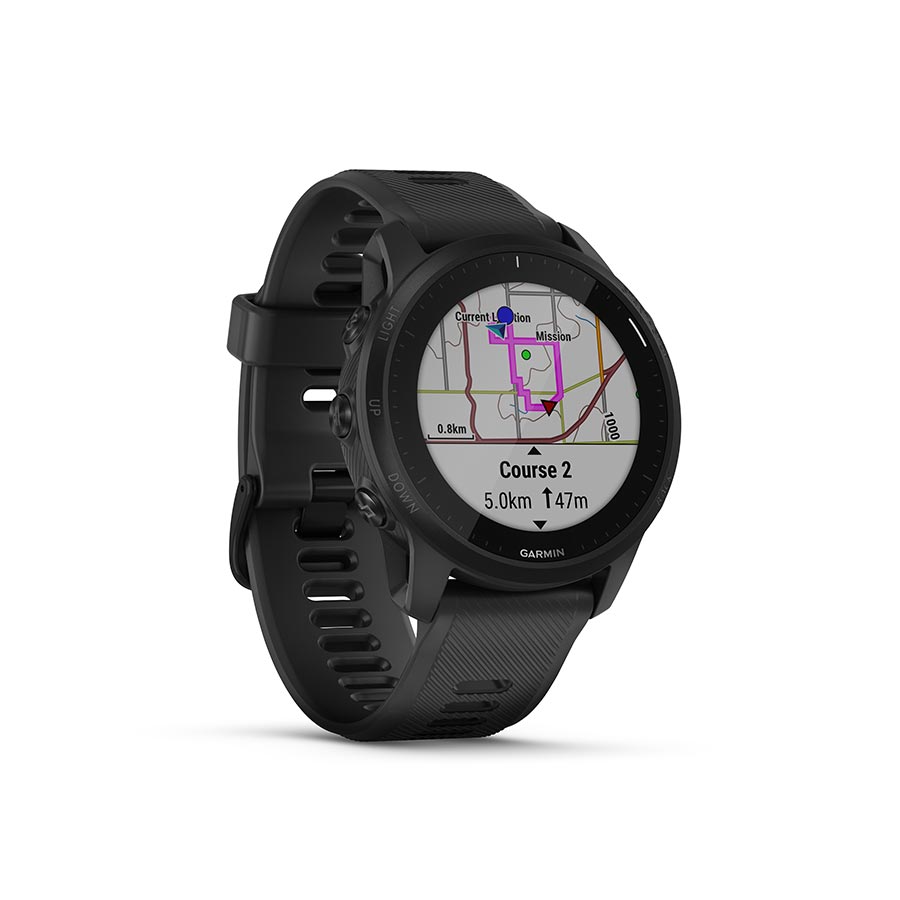 Garmin Forerunner 55 watch with aqua silicone wristband, showing digital display on a fitness tracker.