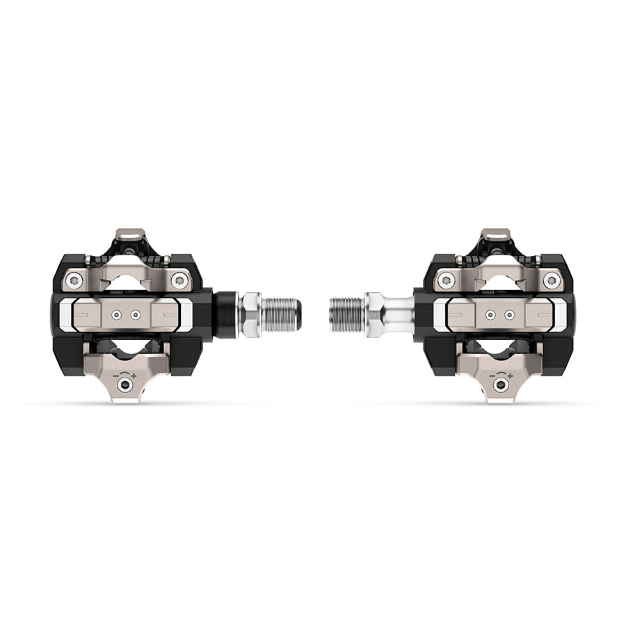 Garmin Rally XC clipless MTB pedals with carbon body, stainless steel spindle, black finish, designed for mountain biking performance.