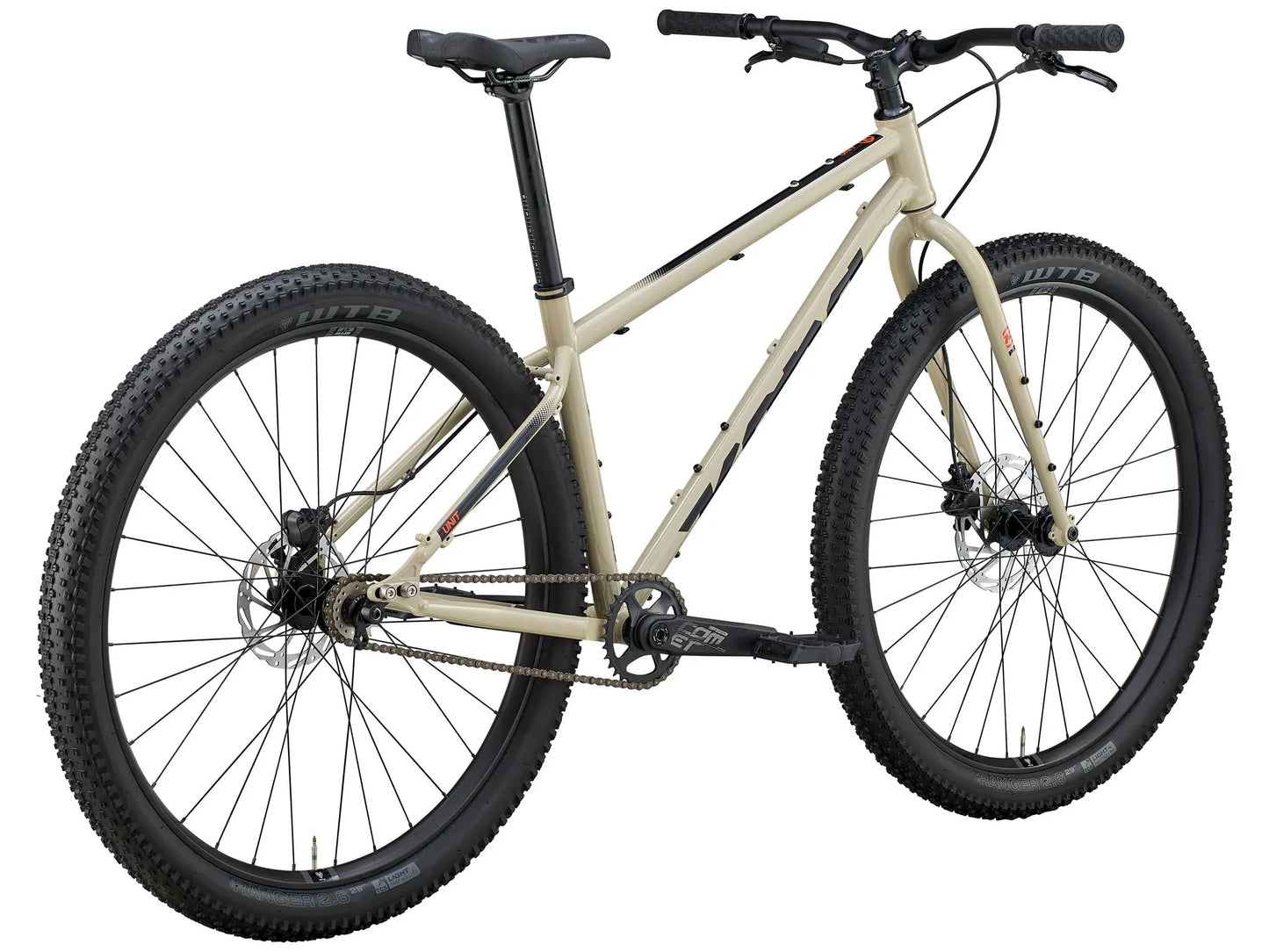 Kona Unit touring bike with custom build, featuring a sturdy frame, wide tires, and handlebars suitable for long-distance riding.