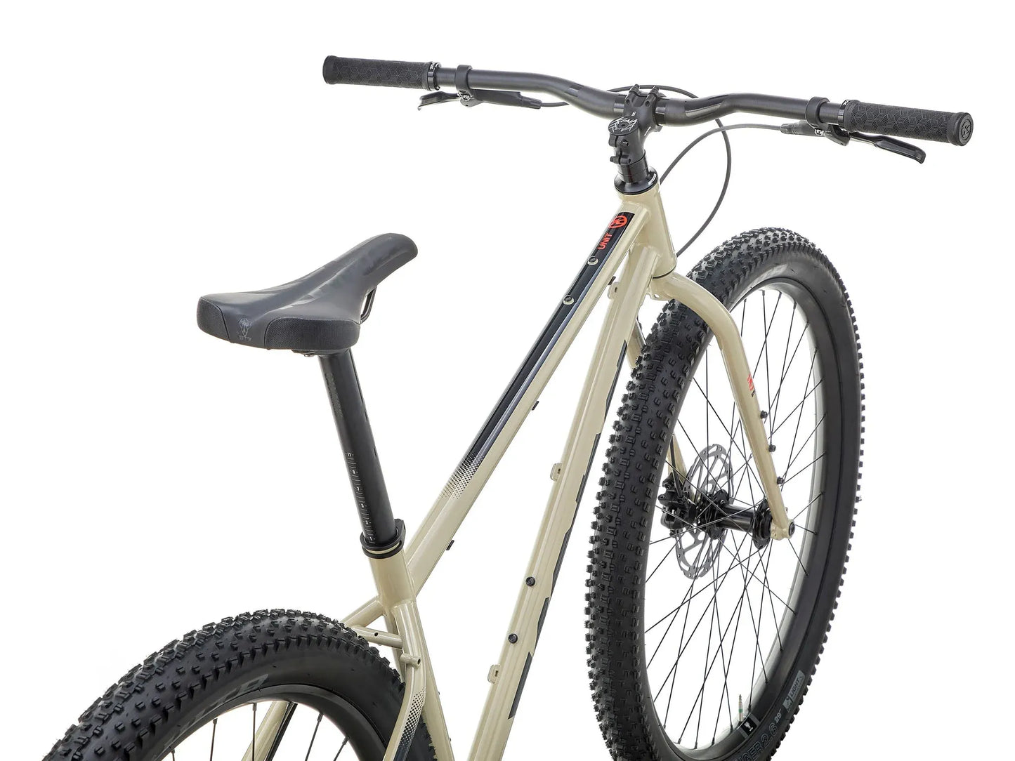 Kona Unit touring bike with custom build, featuring a sturdy frame, multiple gears, and off-road tires for versatile riding.