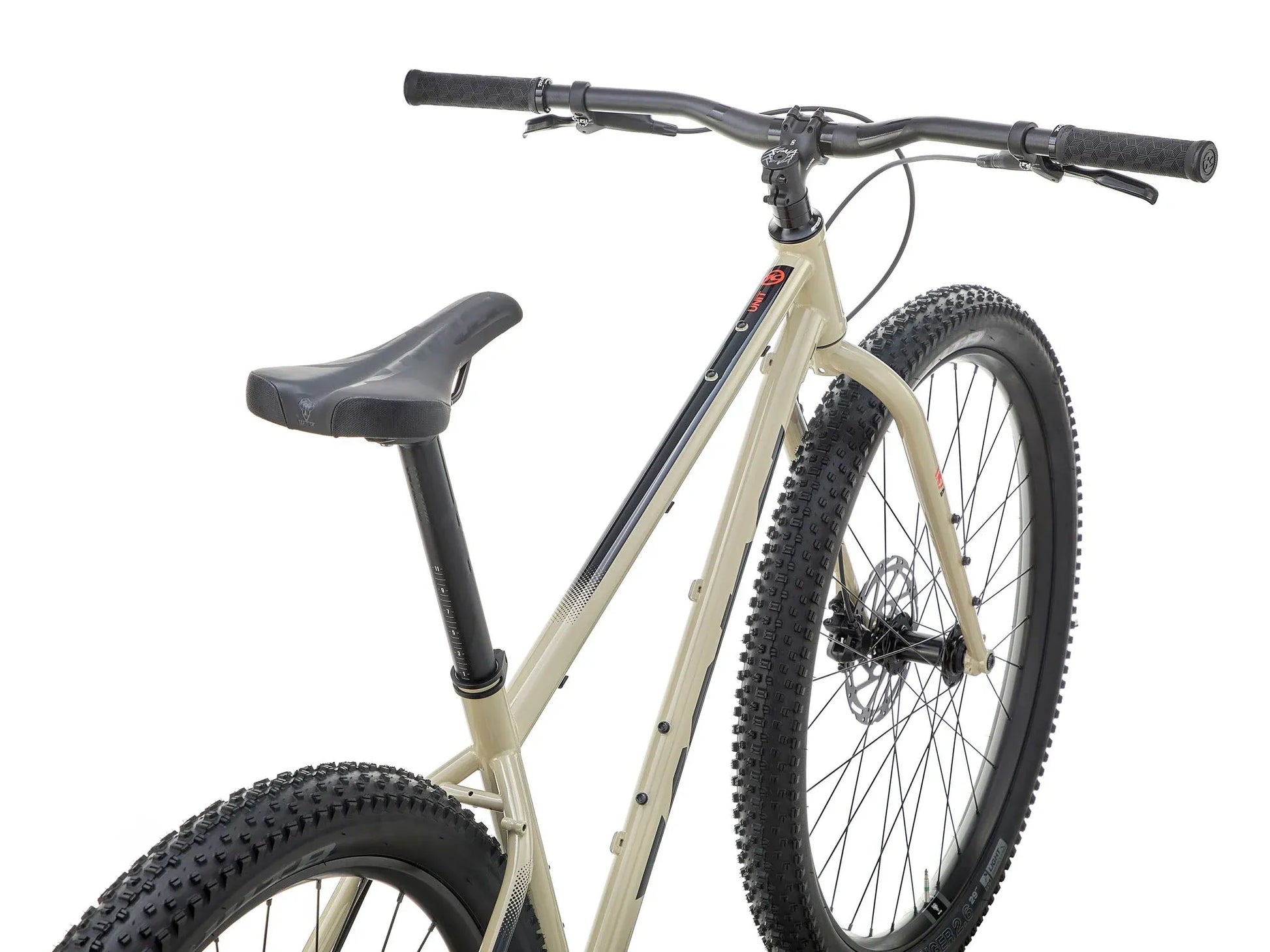 Kona Unit touring bike with custom build, featuring a sturdy frame, multiple gears, and off-road tires for versatile riding.