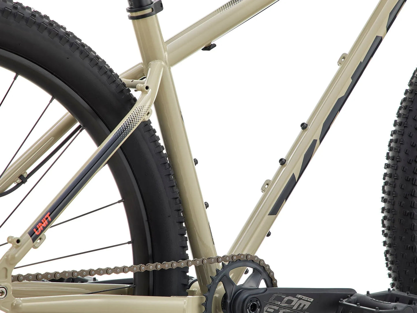 Kona Unit touring bike with custom build, featuring a lightweight frame, wide tires, and drop handlebars for versatile riding.