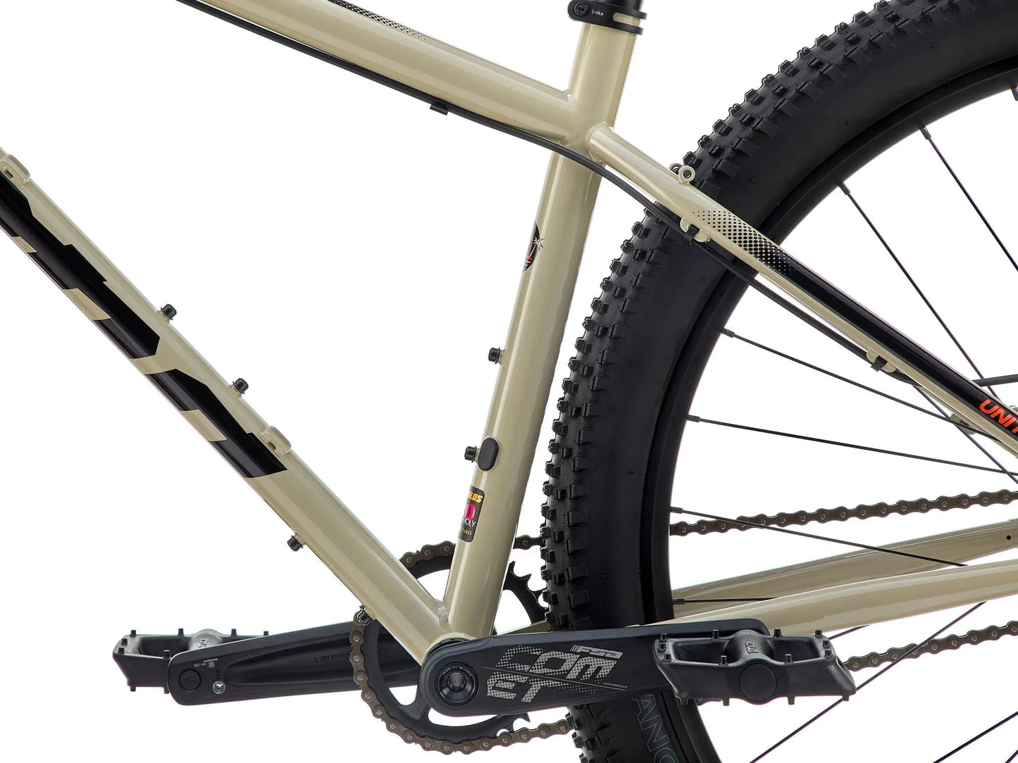 Kona Unit touring bike with custom build, featuring a lightweight frame, drop handlebars, and off-road tires for versatile riding.
