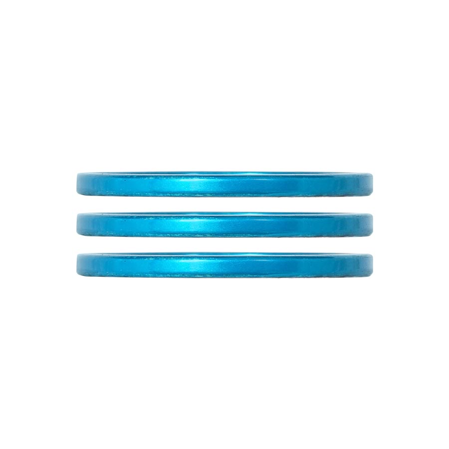Industry Nine iRiX headset spacers in turquoise, 5mm aluminum set of three for bike handlebar assembly