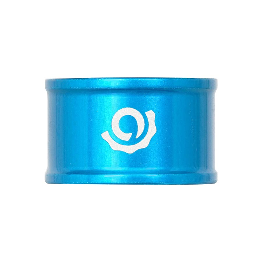 Set of three turquoise aluminum iRiX Industry Nine headset spacers, 5mm height, for bicycle handlebar and fork fitting.