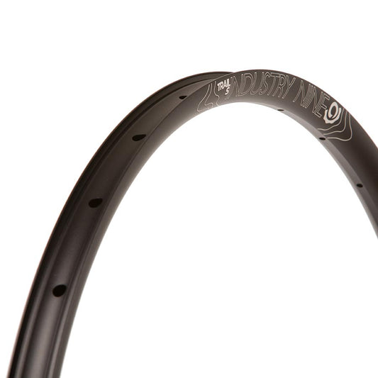 Black Industry Nine Trail S 27.5-inch mountain bike rims with 28 holes, designed for durable off-road cycling.