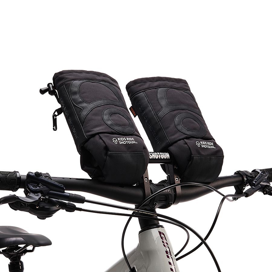 Pair of black Kids Ride Shotgun Pogies for baby seat accessories, providing warmth and protection for young riders.