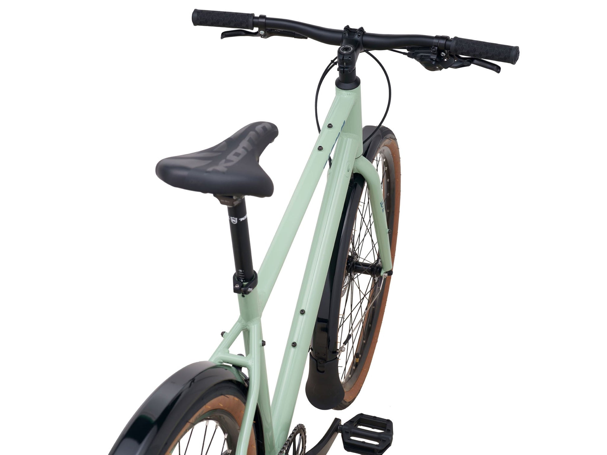 Kona Dew DL urban city bicycle with black frame, front suspension, and 700c wheels, designed for comfortable city riding.