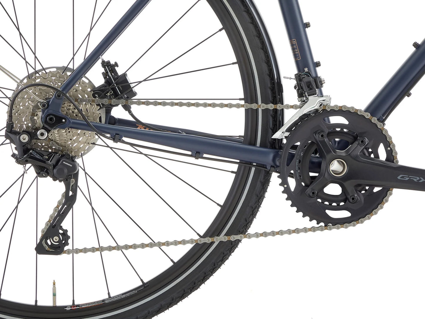 Kona Sutra touring bike with sturdy frame, drop handlebars, and multiple gears for comfortable long-distance cycling.