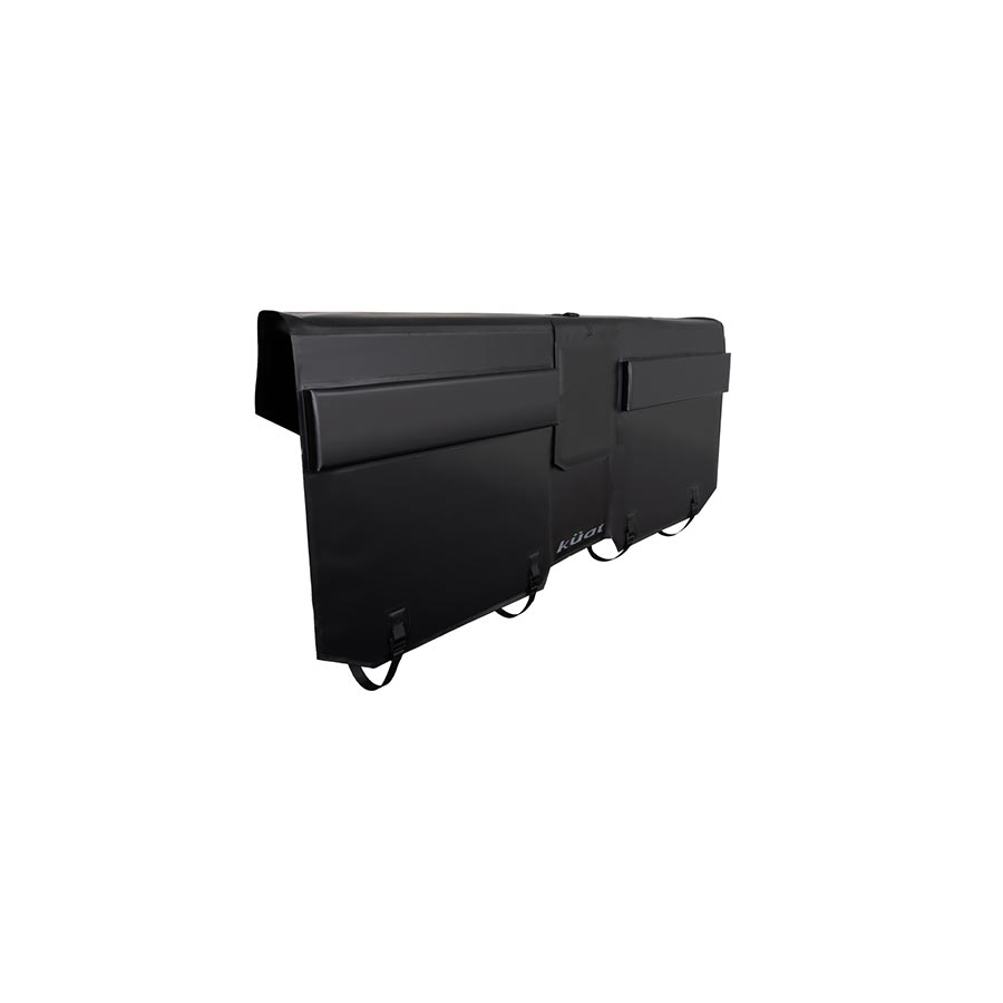 Kuat Huk tailgate pad on truck bed racks with 61-inch curved design, featuring padded straps and mounting hardware.
