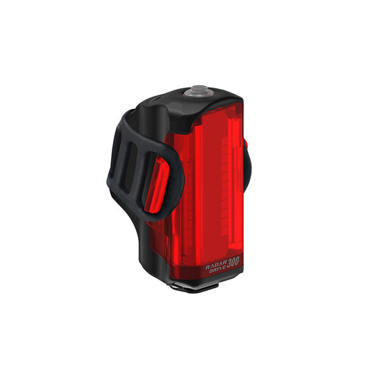 Lezyne Radar Drive rear bike light mounted on a bicycle, showing bright LED illumination for rear visibility.
