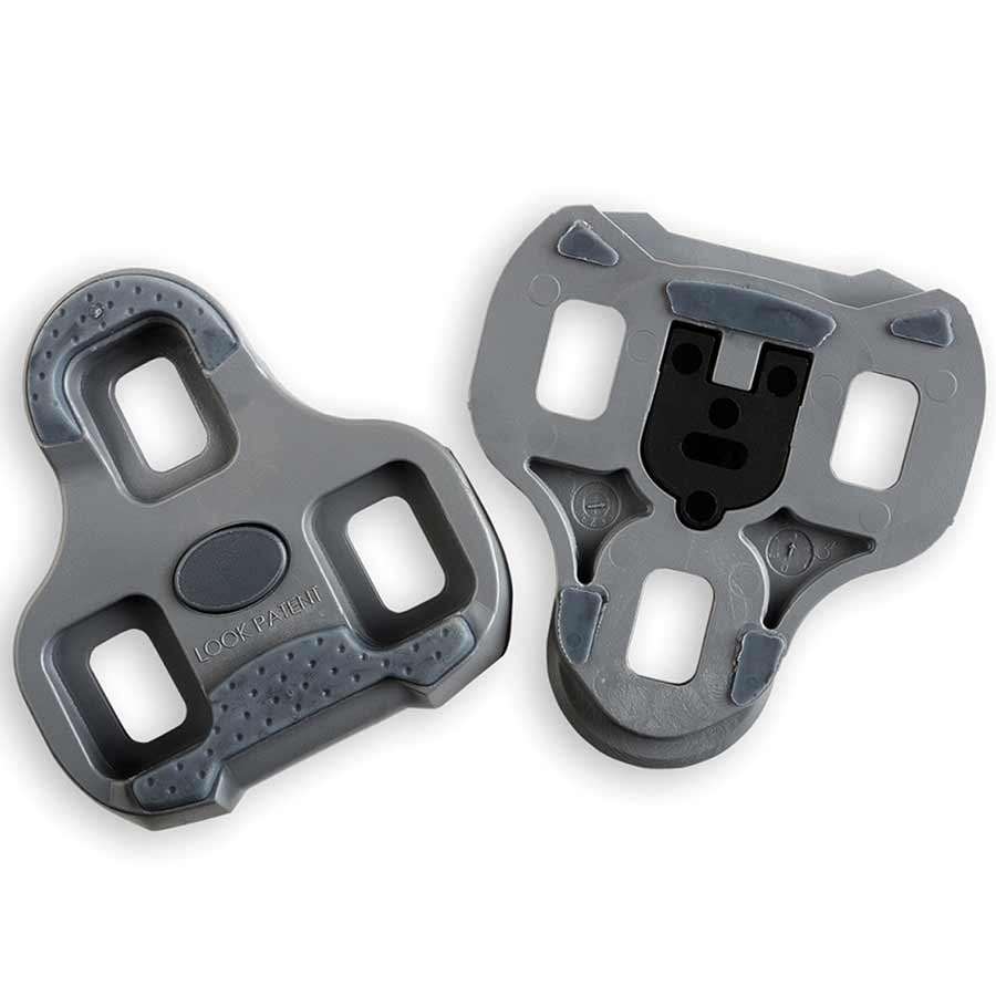 Grey Look Keo Grip cleats for cycling shoes, showing the textured surface and brand logo on the cleat.