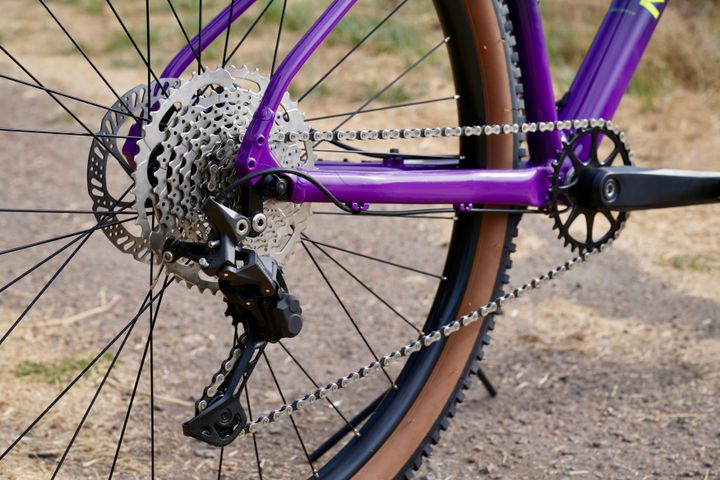Marin Bobcat Trail 4 hardtail MTB bicycle with black frame and knobby tires, suitable for trail riding and outdoor adventures.
