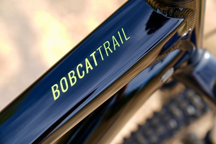 Marin Bobcat Trail 4 hardtail MTB bicycle with black frame and suspension fork, ready for trail riding.