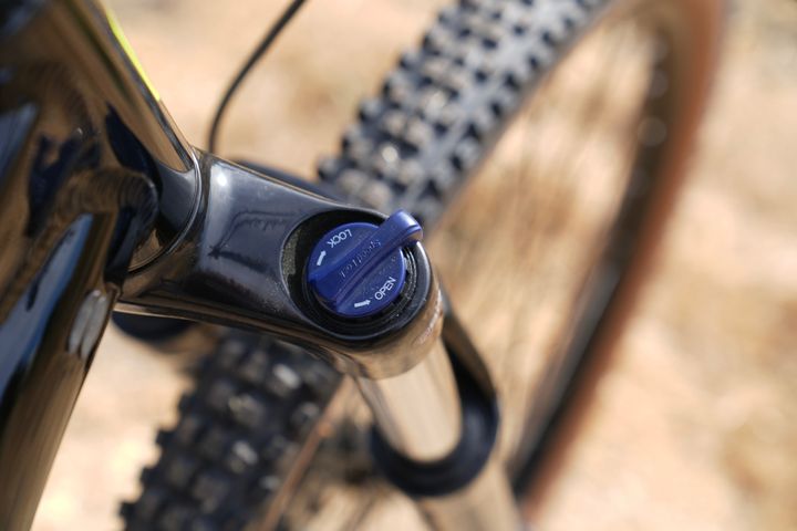 Marin Bobcat Trail 4 hardtail mountain bike with black frame, knobby tires, and front suspension for trail riding.