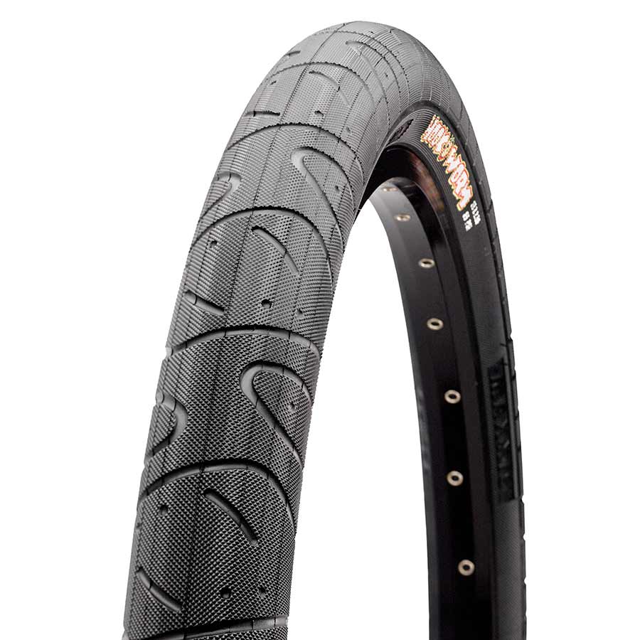 Maxxis Hookworm BMX and dirt jump tire, 20 x 1.95-inch wire clincher, black rubber with tread pattern for off-road riding.