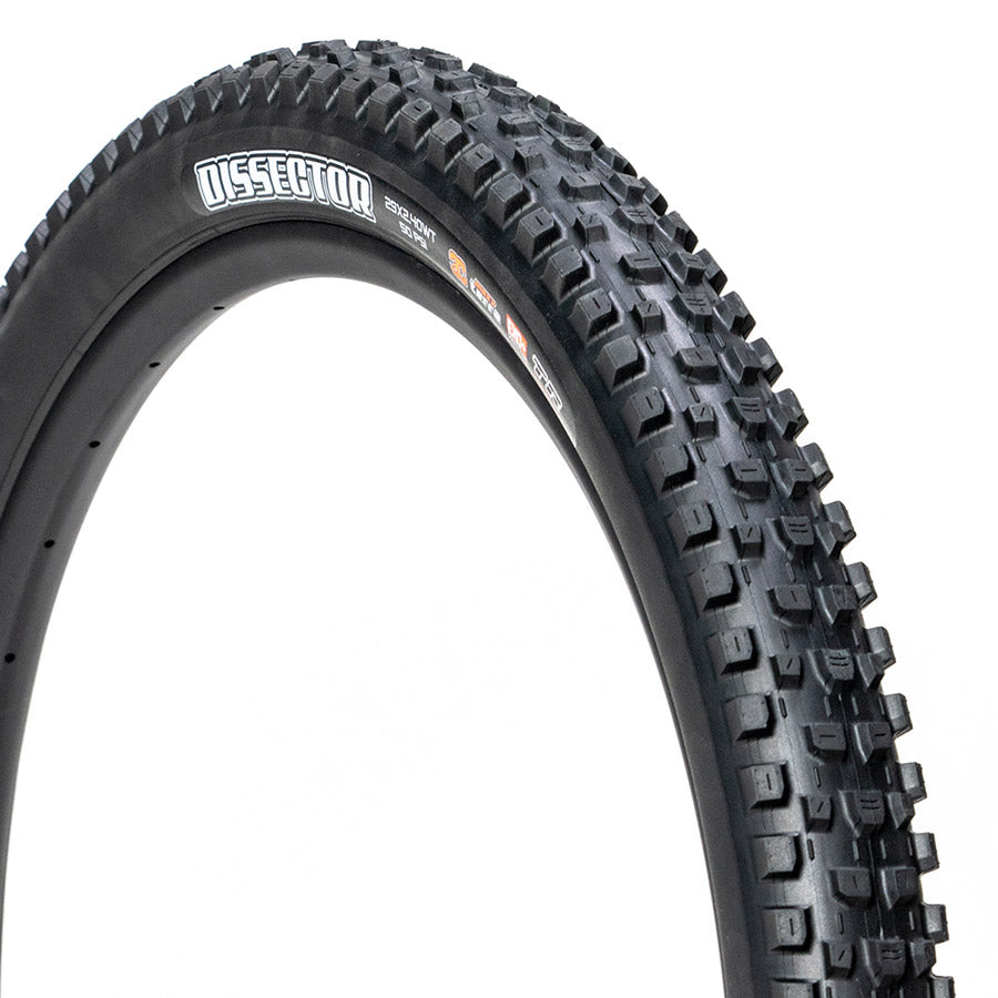Maxxis Dissector II mountain tires with 3C Maxx Grip compound and Exo protection on black rubber with wide trail tread.