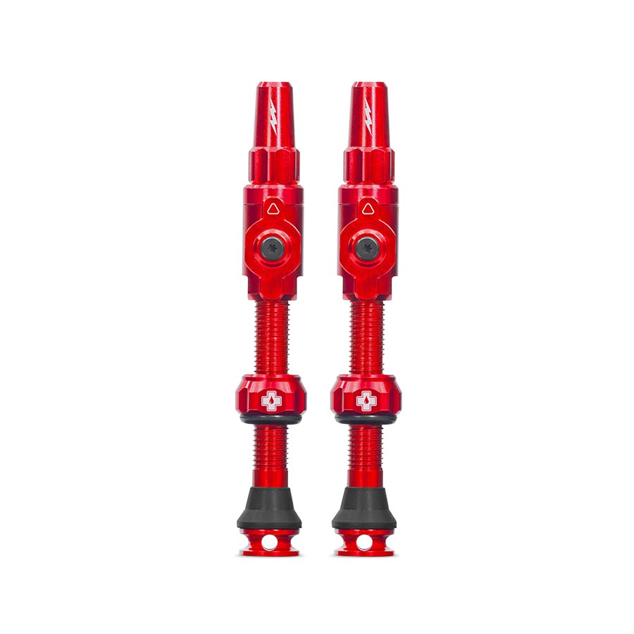 Pair of Muc-Off Big Bore Lite Small tubeless valves with black Presta valves, 30mm length, designed for bike wheel tubeless setups.