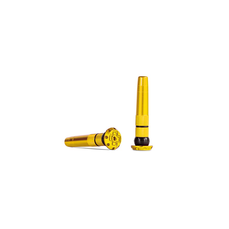 Pair of Muc-Off Stealth Tubeless Plugs for tubeless tire repair, black, durable rubber repair inserts.