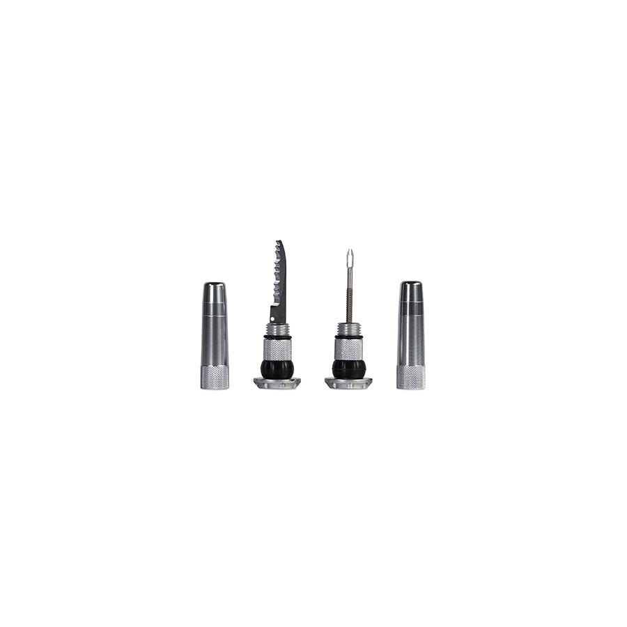 Pair of Muc-Off Stealth Tubeless Plugs for tubeless tire repair, black, durable rubber, designed for quick puncture fixes.